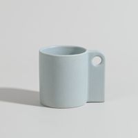 taza de ceramica azul claro