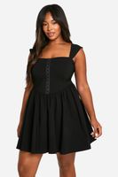 vestido plus mini de tela elastica estilo corse de manga corta negro
