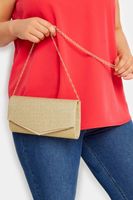 cartera de mano dorada con brillo