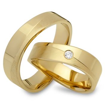 Alianzas 18 quilates oro amarillo con diamante