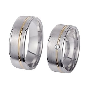 Alianzas oro amarillo y blanco con diamante ancho 7 mm