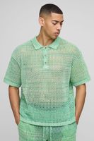 polo oversize de punto retorcido con botones y cuello verde