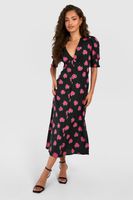 vestido midi de flores con punos fruncidos negro
