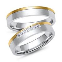 alianzas en oro amarillo y blanco con 7 diamantes