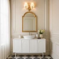 mueble de bano blanco con puertas talladas