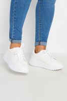 deportivas blancas con suela gruesa acanalada en ancho especial