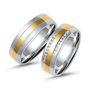 Alianzas de oro amarillo y blanco con 18 diamantes