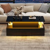 mesa de centro elevable hasta 55 cm negra con cuatro cajones e iluminacion led