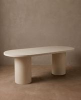mesa de comedor ovalada de microcemento en tono blanco roto 180x75cm