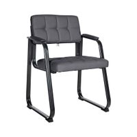 silla con patas de metal y asiento en simil cuero gris