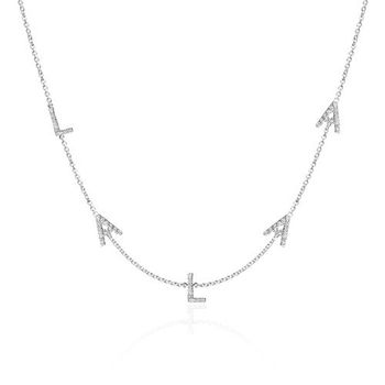 Cadena mujer letras en oro blanco de 14 quilates con diamantes