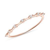 anillo de mujer en oro rosa de 14 quilates con topacios blancos