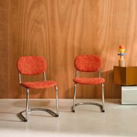 silla cantilever redondeada de metal tela chenille y patas cromadas