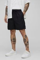 pantalon corto holgado de largo medio con cintura elastica y mezcla de lino negro