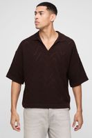 polo oversize recto con costuras geometricas brown