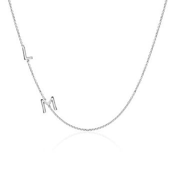 Cadena de mujer de oro blanco 14 quilates con 2 letras