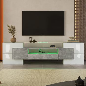 Mueble de TV blanco con iluminación LED y superficie de cristal.