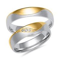 alianzas de oro blanco y amarillo con 3 diamantes