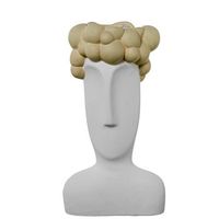 jarron de un busto blanco y crema