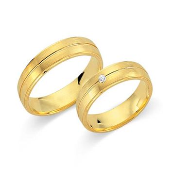 Alianzas oro amarillo 18 quilates con diamante