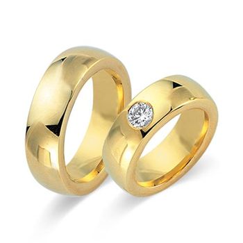 Alianzas oro amarillo 18 quilates con diamante
