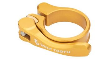 Abrazadera para tija de sillin con forma de diente de lobo  liberacion rapida  dorado