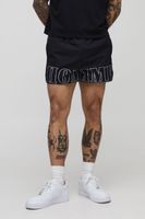 pantalon corto de nailon con estampado y cintura elastica negro