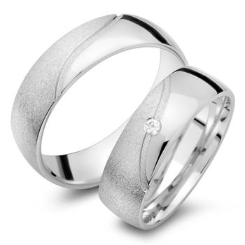 Alianzas 18 quilates oro blanco con diamante