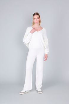 suéter con flecos off white m