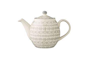 Tetera de cerámica blanca