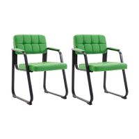 set de 2 sillas con patas de metal y asiento en simil cuero verde