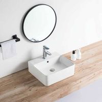lavabo blanco brillante sobre encimera ceramico venado 46 x 42 cm