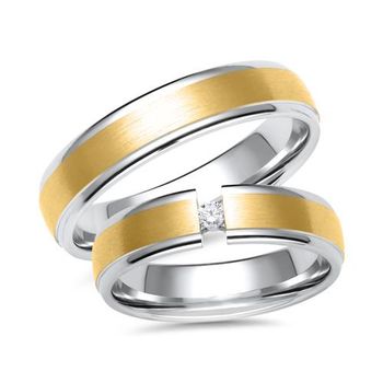 Alianzas de oro blanco y amarillo con diamante