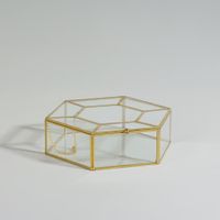 joyero de vidrio transparente y laton dorado