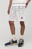 pantalon corto holgado de punto con bordado de croche man cream
