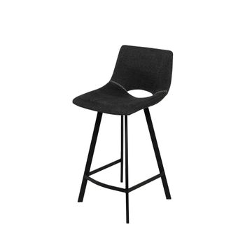 Taburete bajo con tapizado gris oscuro y patas negras.