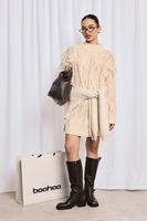 vestido mini de punto en ochos con borlas beige
