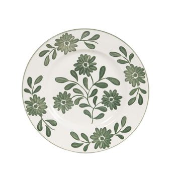 Plato de postre de cerámica blanca y flores y hojas verdes