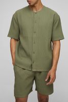 camisa oversize de manga corta plisada sin cuello verde