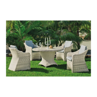 conjunto mesa redonda y 4 sillones con cojines para terraza