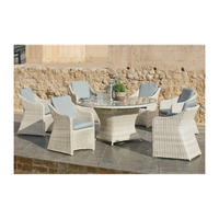 conjunto mesa redonda y 6 sillones con cojines para terraza