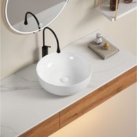lavabo de apoyo redondo en ceramica blanca