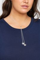 collar plateado tipo lazo con estrellas