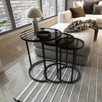 set de 3 mesas nido kyyjarvi metalcristal templado ahumado 58x o 50 cm negrotransparente encasa