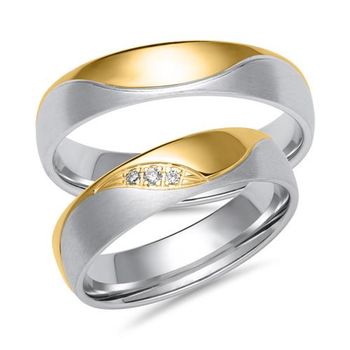 Alianzas de oro blanco y amarillo con 3 diamantes