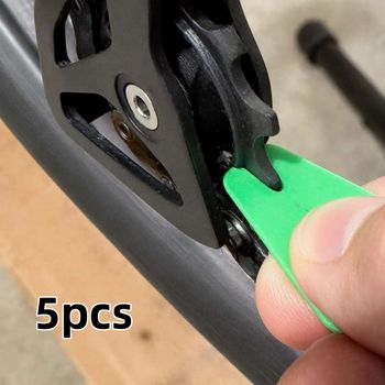 Polea de cadena de plástico de 12 velocidades para mantenimiento de bicicletas, raspador de limpieza, herramienta para quitar suciedad de ruedas de desviador de bicicleta