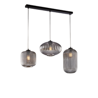 carril glamour de hierro lacado en negro con cables orientables y difusores de cristal soplado gris espejado con dec forro en relieve de 3 luces