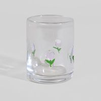 vaso de vidrio transparente con flor