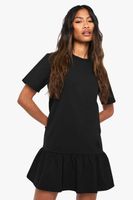 vestido camiseta holgado con volante en el bajo negro