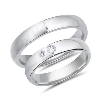 Alianzas oro blanco 18 quilates 2 diamantes